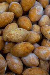 Fototapeta na wymiar Close-up uncooked kibbeh. Stuffed meatballs as background texture