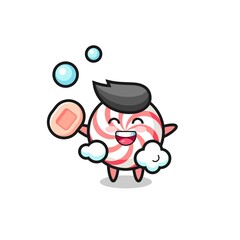 candy character is bathing while holding soap