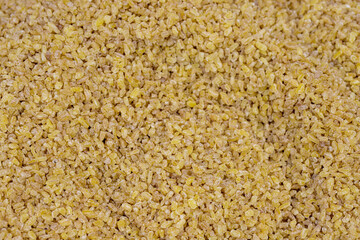 Close-up bulgur grains. Bulgur as a background texture