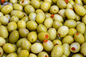 Pepper Stuffed Green Olives. Close up. Green olives as background texture