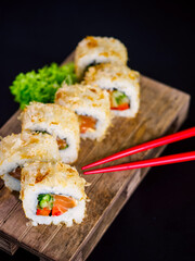 Katsuobushi Uramaki Sushi Roll with salmon and cucumber