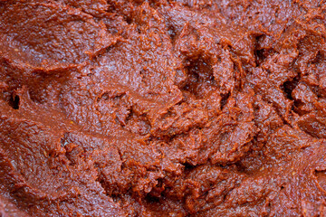 Tomato paste. close up. Tomato paste as background texture