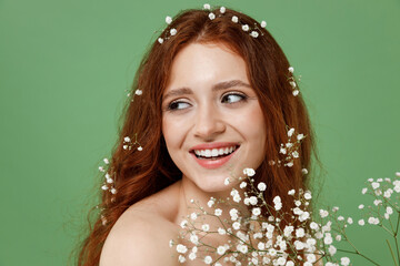 Beautiful nice half naked topless redhead hair woman 20s with nude make up white tender flowers...