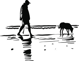 silhouette of a person with a dog on the beach