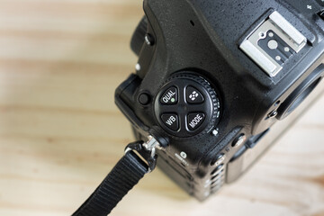 DSLR Hotshoe mount and mode dial ring close up overhead view.