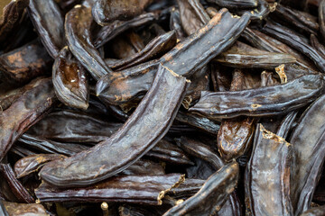 Carob. close up. Carob as a background texture