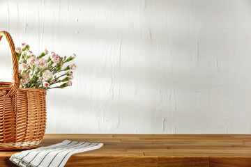Wooden desk of free space and picnic basket 