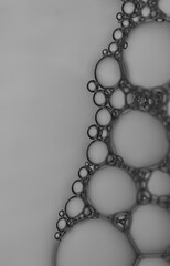 Abstract  soap bubble and pattern on silver-grey background.