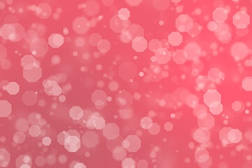 Abstract pink background with bokeh pattern.
