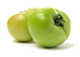 fresh green tomato isolated on white background