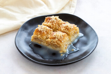 Sutlu nuriye Baklava or baklava with milk. Turkish baklava on a white background. Local name Sütlü nuriye baklava