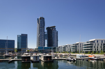 Fototapeta na wymiar CITYSCAPE - A marina and a prestigious district of a dynamic and modern seaside city 