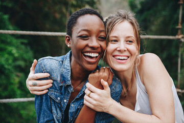 Happy women hugging each other - Powered by Adobe