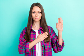 Photo of serious long hairdo young lady pray wear checkered shirt isolated on vivid teal color...