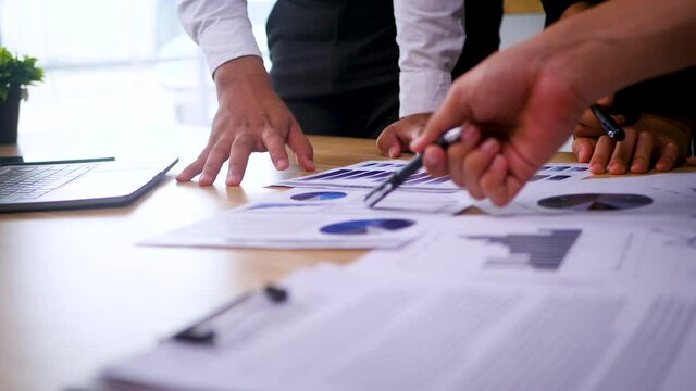 Business peoples meeting to analyze and discuss for situation on the marketing. Selected focus. 4K