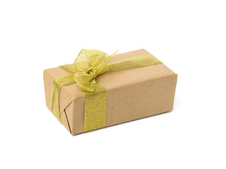 rectangular box wrapped in brown kraft paper and golden ribbon.