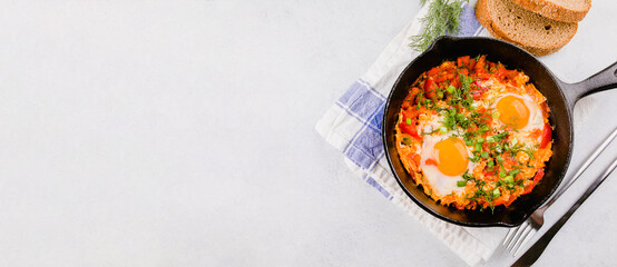 Keto meal, diet. Shakshuka. Eggs poached with tomatoes sauce. Breakfast food concept, Top view