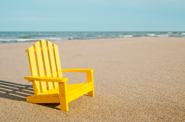 miniature chair on the beach