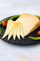 Kashar cheese or kashkaval cheese. Sliced Cheddar Cheese. gourmet cheese. local name trakya kaşar peyniri