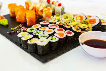 Japanese food. sushi. seafood fabrics. Japanese culture. White background.  plate of Japanese traditional cuisine, sushi. wonderful and delicious food. asian food and cuisine 