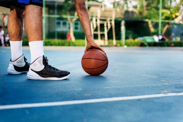 Young basketball player shoot