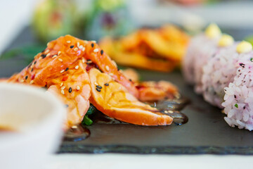 Japanese food. sushi. seafood fabrics. Japanese culture. White background.  plate of Japanese traditional cuisine, sushi. wonderful and delicious food. asian food and cuisine 