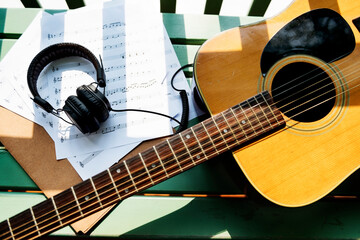 A guitar and earphones