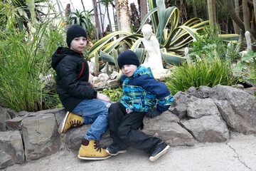 Two brothers in greenhouse of Nikitsky Botanical Garden