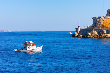 Wooden boat entering to Hydra Island in Saronikos gulf in Greece - 439313534
