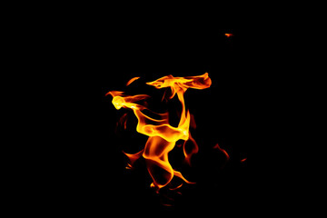 Real flames from underground gas isolated on black