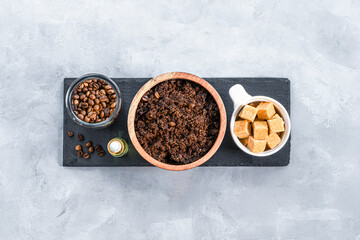 Homemade body scrub of ground coffee, sugar and coconut oil, homemade cosmetic for peeling top view