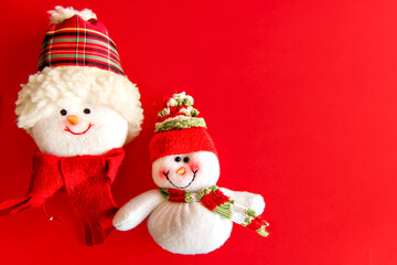 Christmas ornaments on the red background.