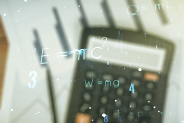 Double exposure of scientific formula hologram on blurry calculator background, research and development concept