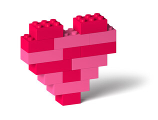 Red pink color 3d heart made of toy building blocks