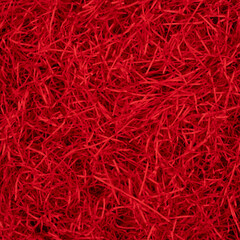 Fototapeta premium background of red shredded paper