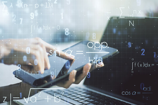Creative scientific formula concept with finger clicks on a digital tablet on background. Multiexposure