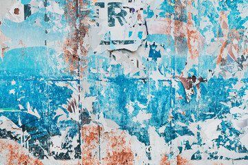 Torn ripped poster paper surface as abstract grunge background