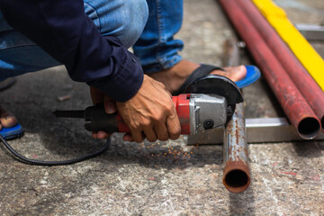 without safety gloves at work. Construction workers do not wear gloves and safety shoes to work....