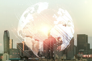 Double exposure of abstract digital world map on Los Angeles city skyscrapers background, research...