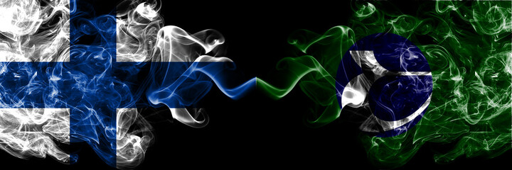 Naklejka premium Finland, Finnish vs Japan, Japanese, Tobetsu, Hokkaido, Ishikari, Subprefecture smoky flags side by side.