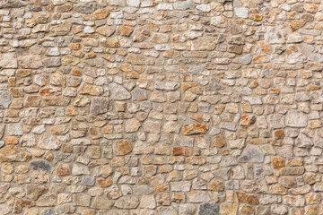 Architecture textures, detailed and rustic of paired masonry granite, traditional spanish granite wall