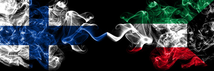 Finland, Finnish vs Kuwait, Kuwaiti smoky flags side by side.