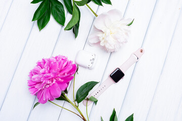 Watch and headphones with pink flowers