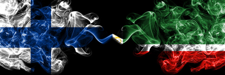 Finland, Finnish vs Russia, Russian, Chechen Republic smoky flags side by side.