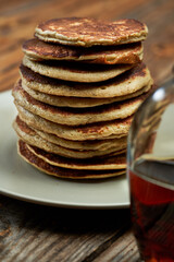 Banana and oat pancakes with maple syrup