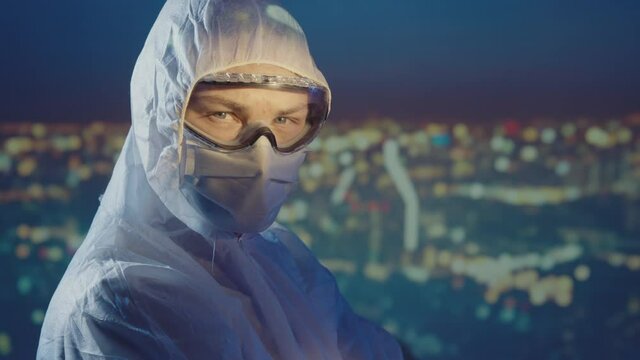 Doctor microbiologist scientist in a protective PPE suit