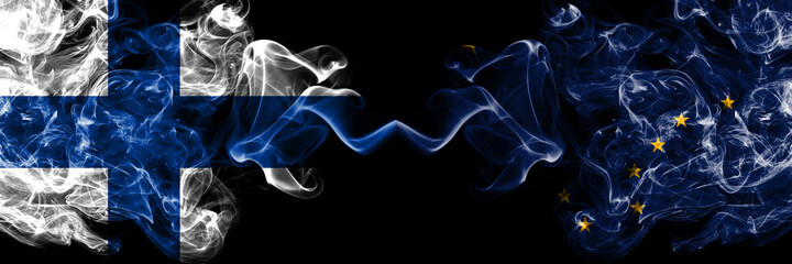 Finland, Finnish vs United States of America, America, US, USA, American, Alaska, Alaskan smoky flags side by side.