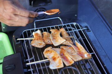 cooking meat on the grill