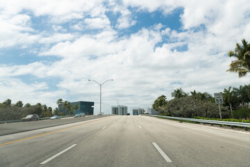 Fototapeta na wymiar Empty high road on cloudy outdoors in Palm Beach Florida USA, highway