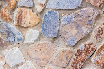 The walls are made of natural stone. background, texture. Close-up background.